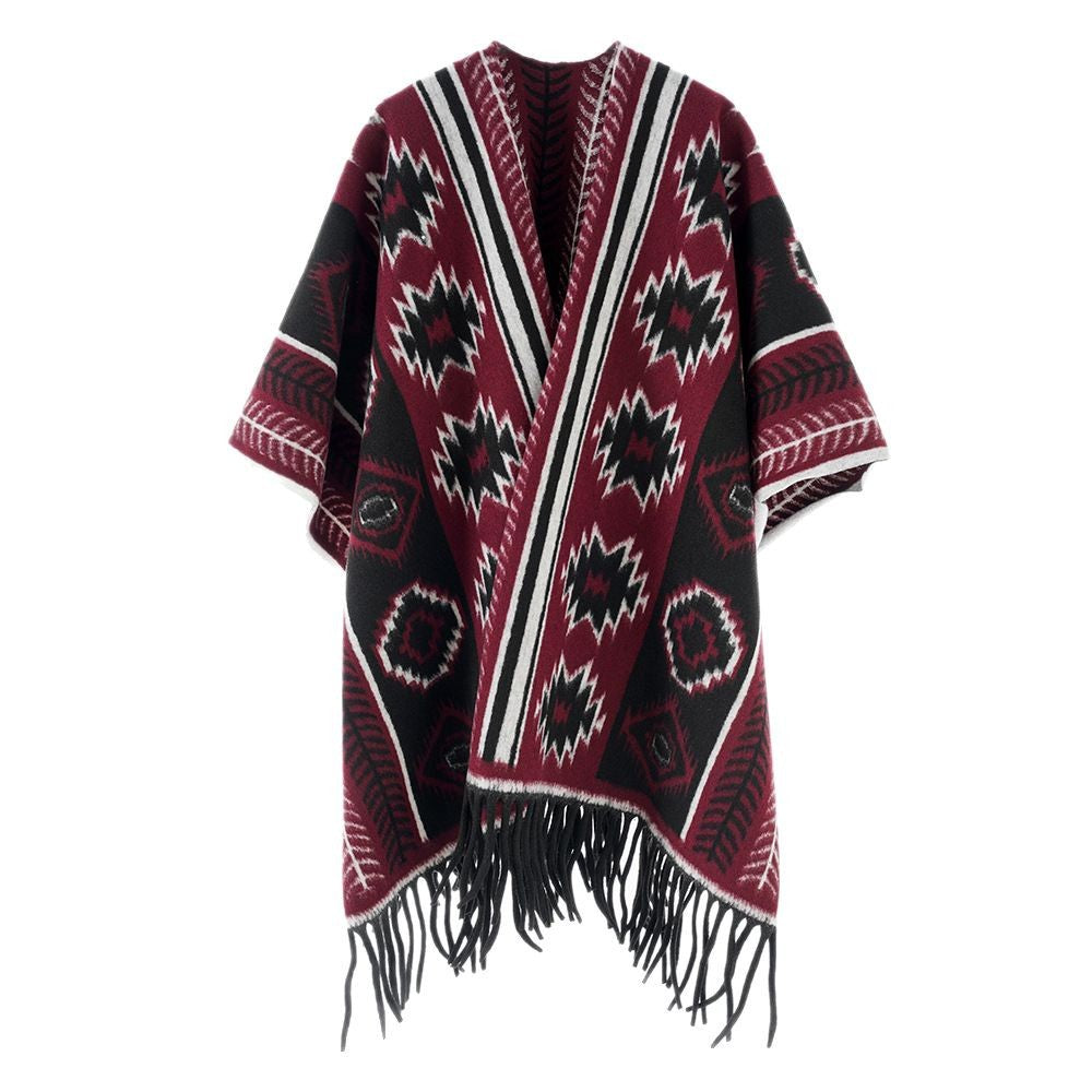 Dam Aztec-inspired fringe poncho cape i oversized rectangular skärning