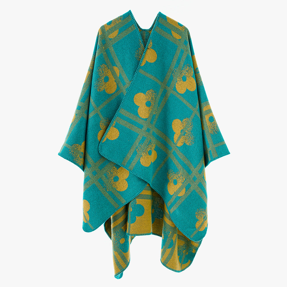 Dam Reversible Jacquard poncho tillverkad av ullblandning med floral check mönster och decorative piping seam