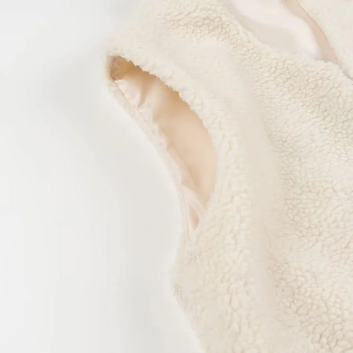 Dam mysig sleeveless bouclé väst med V-neck och satin foder