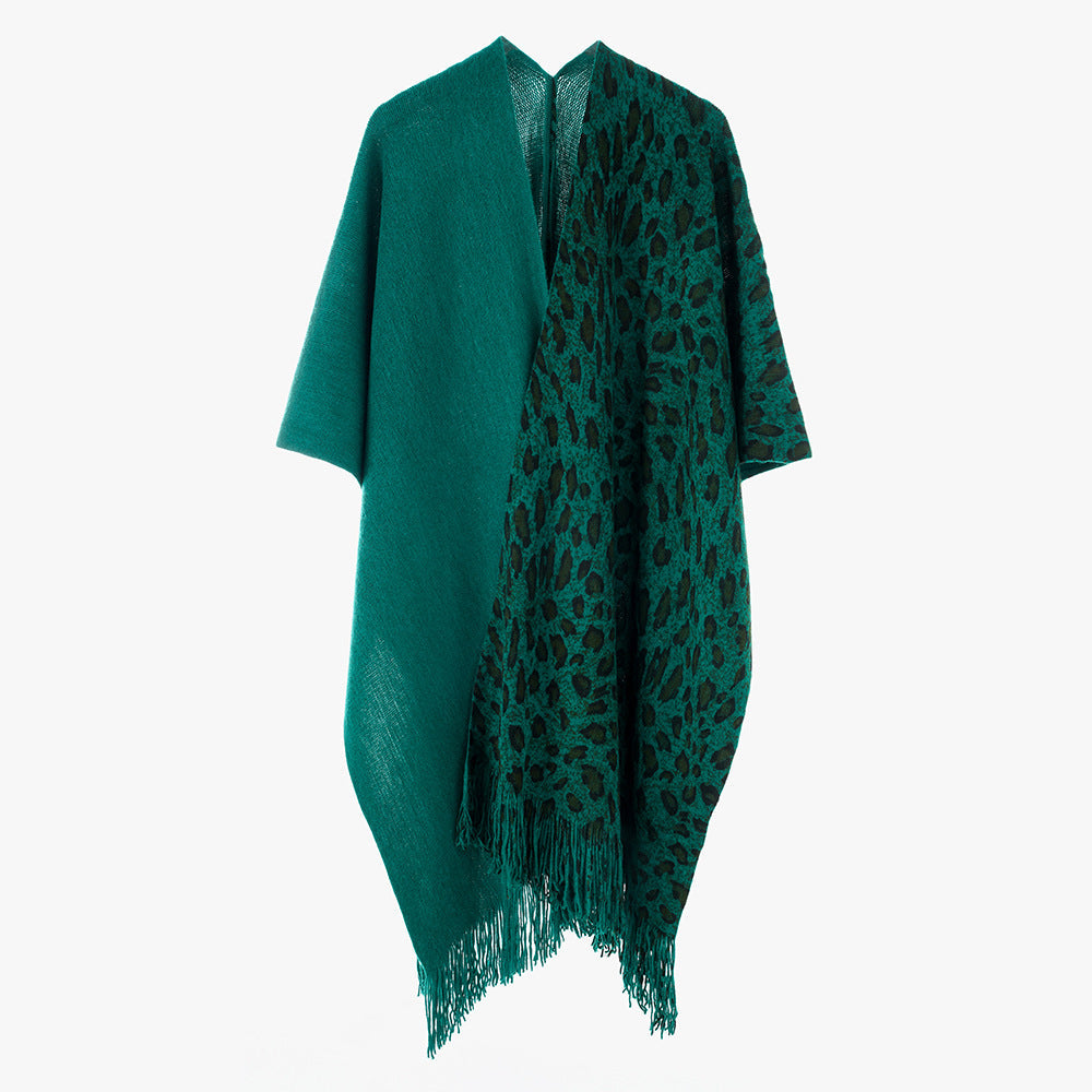 Dam Reversible capeponcho med Leo Jacquard, Fringes och Boxy oversized skärning