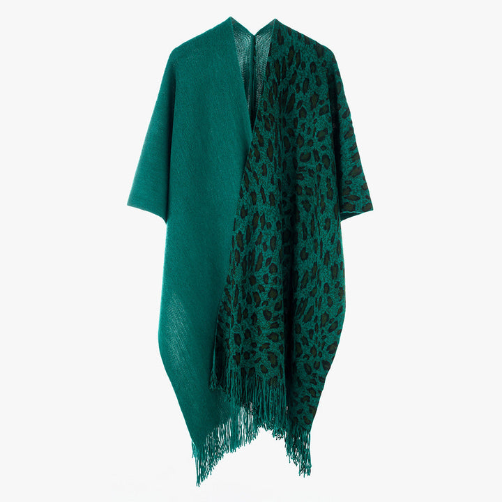 Dam Reversible capeponcho med Leo Jacquard, Fringes och Boxy oversized skärning