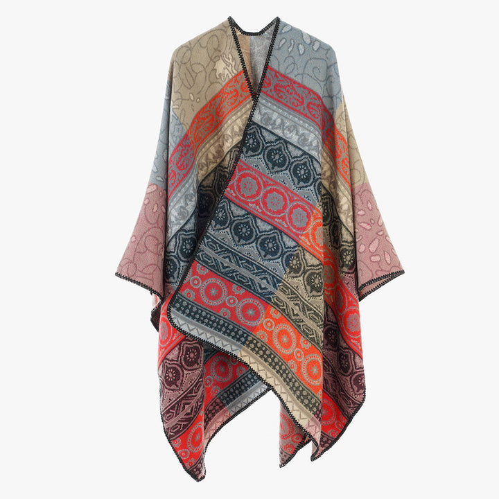Dam Jacquard Cape med geometric ornament mönster och kontrasterande overlock seam