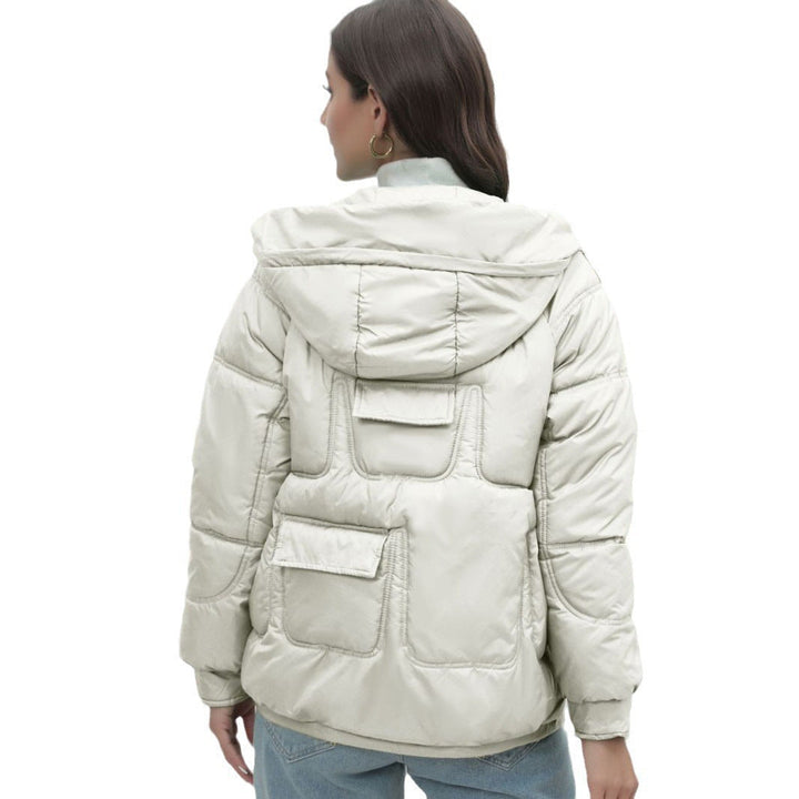 Dam quiltad hooded jacka vadderad med dragkedja och figursydd skärning