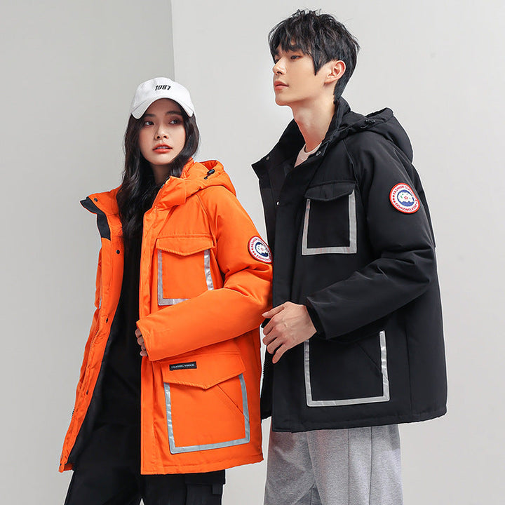 Dam parka jacka med huva, vadderad, reflective detaljer och stor cargo fickor