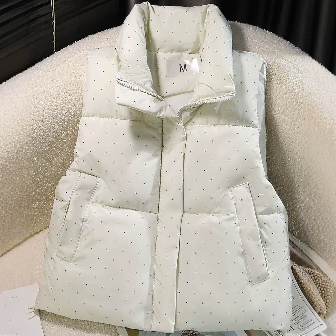 Dam non-quiltad sleeveless thermal väst med high standing krage, concealed dragkedja placket, och fine dot tryck