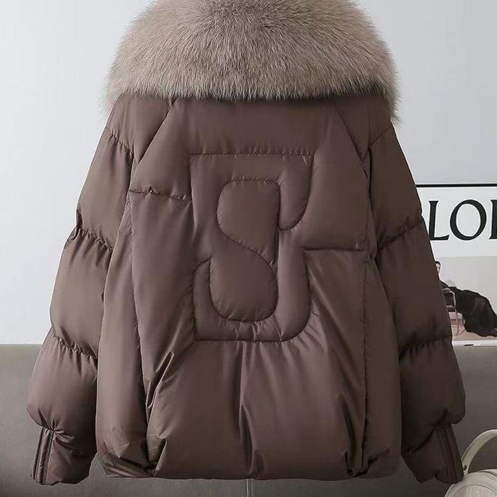 Dam nan kort vadderad jacka med voluminous faux fur krage och midja draw
