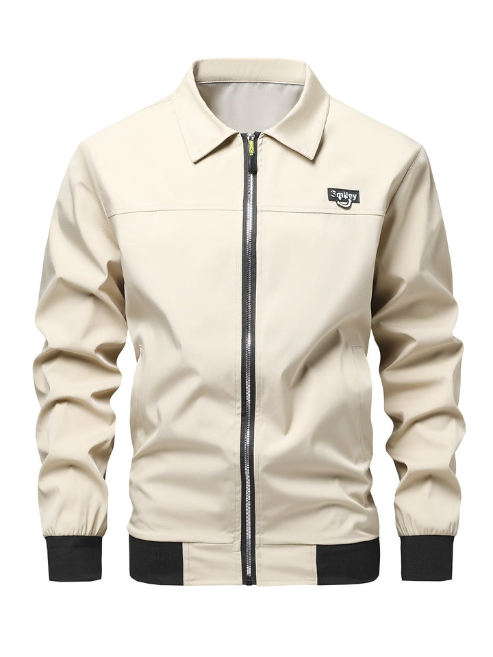 Herr Collar-Zip Blouson Tillverkad av Softshell med Ribbad Muddar och Smiley Patch