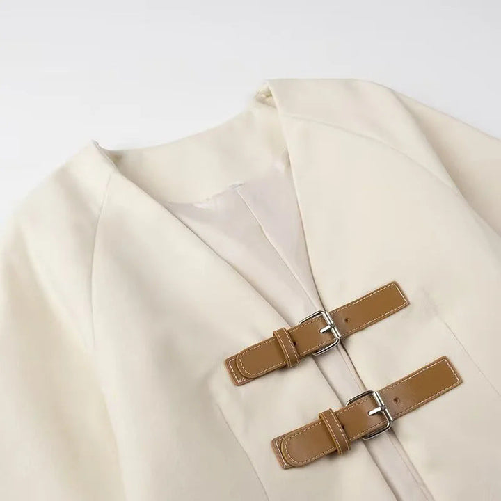 Dam cropped jacka med V-neck, double spännestängning, och boxy silhuett