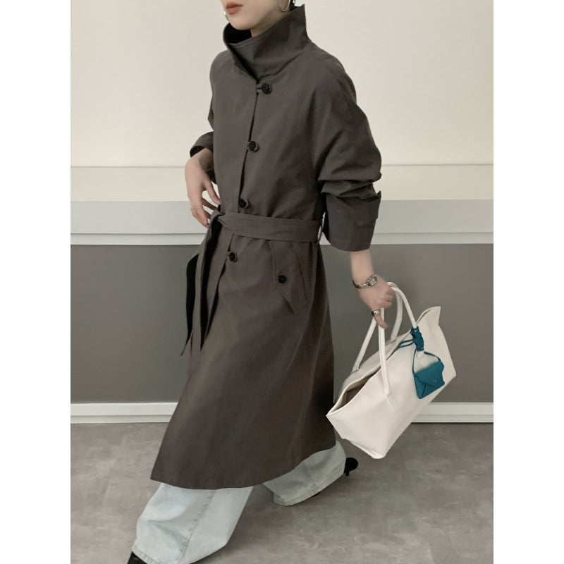 Dam Mid-length trenchcoat med hög ståkrage, knytband och avslappnad oversize silhuett