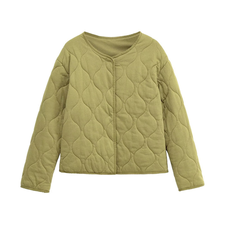 Dam kviltad jacka utan a krage med a boxy silhuett och tonal wave quilting