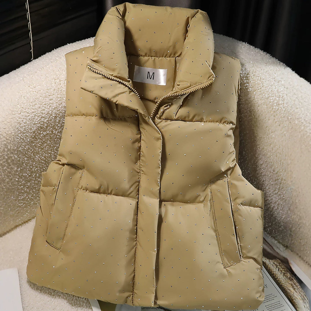Dam non-quiltad sleeveless thermal väst med high standing krage, concealed dragkedja placket, och fine dot tryck