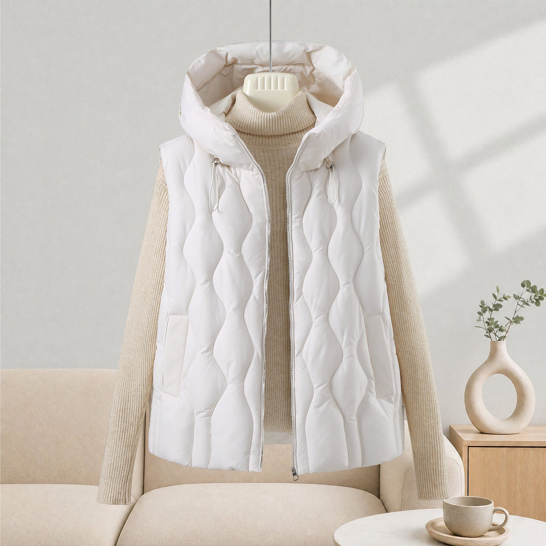 Dam longer skärning quiltad väst med huva, wave quiltning och detachable dragkedja