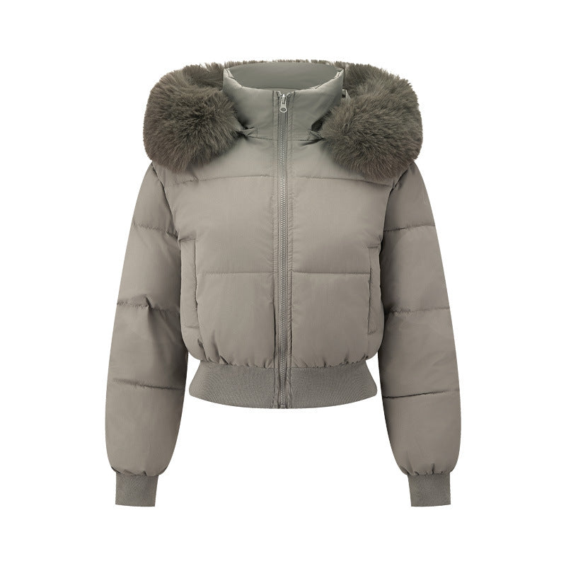 Dam kort quiltad hooded jacka med faux fur kant och ribbed fåll
