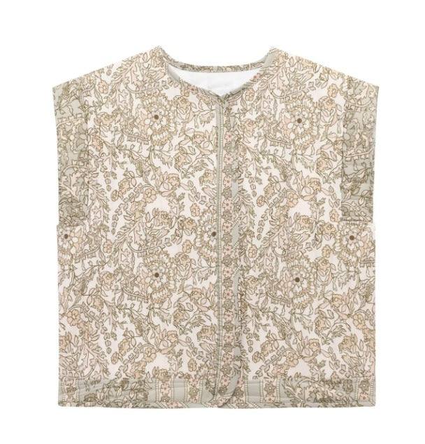 Dam quiltad väst med blommig design och praktiska fickor