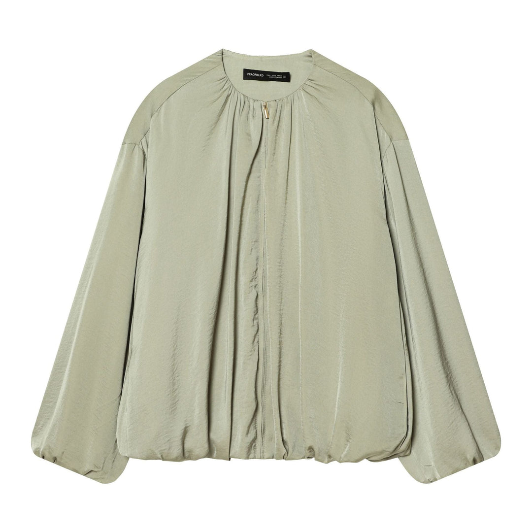 Dam lightly figurnära blousonjacka med gathered round neckline, concealed dragkedja och balloon-shaped ärmar