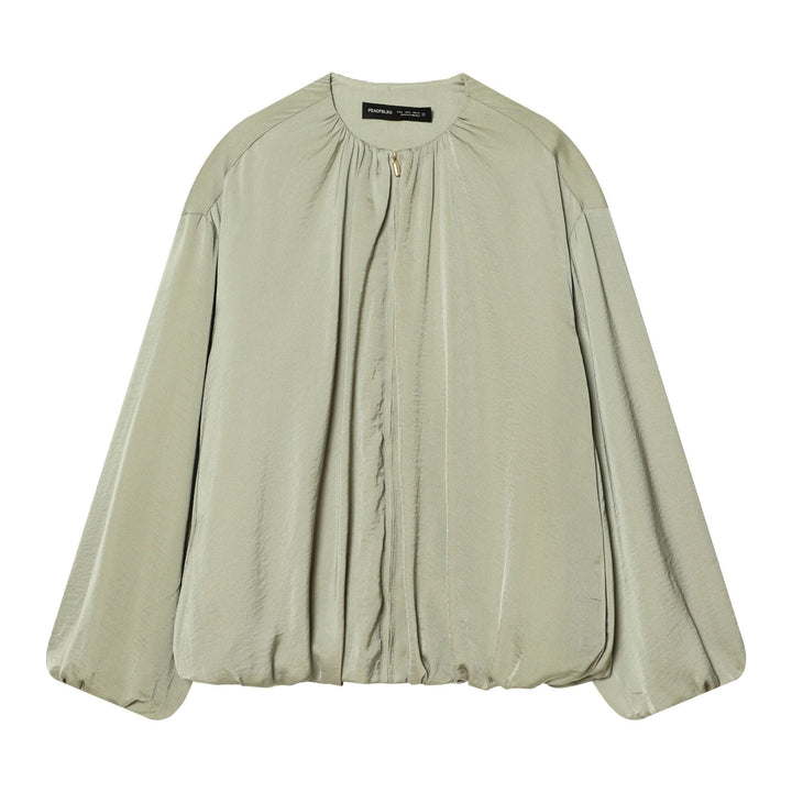Dam lightly figurnära blousonjacka med gathered round neckline, concealed dragkedja och balloon-shaped ärmar