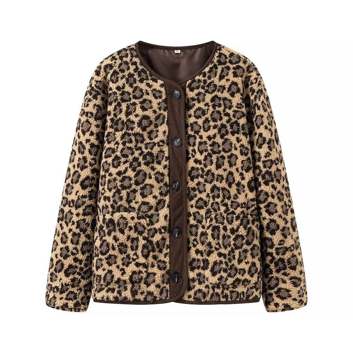 Dam faux sheepskin jacka med leopard mönster, manchester kant, full knäppning, och påsydda fickor