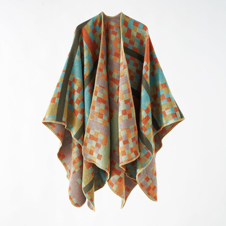 Dam Kastiger Web poncho med graphic jacquard och fringe edge