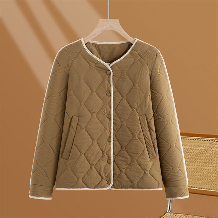 Dam quiltad övergångsjacka med diamond stitching, rund hals och press stud placket