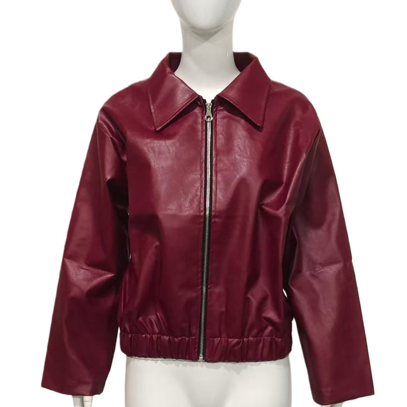 Dam figursydd konstläder blousonjacka med skjortkrage, dragkedja och elastisk fåll
