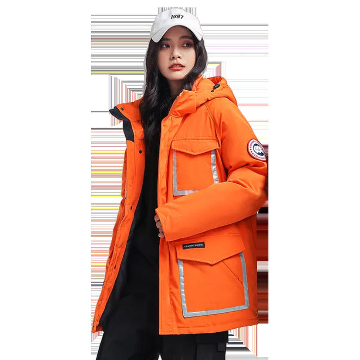 Dam parka jacka med huva, vadderad, reflective detaljer och stor cargo fickor
