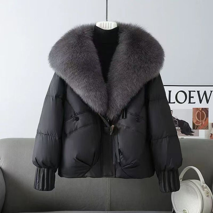 Dam kort vadderad jacka med luxurious faux fur krage och skräddad dragsko