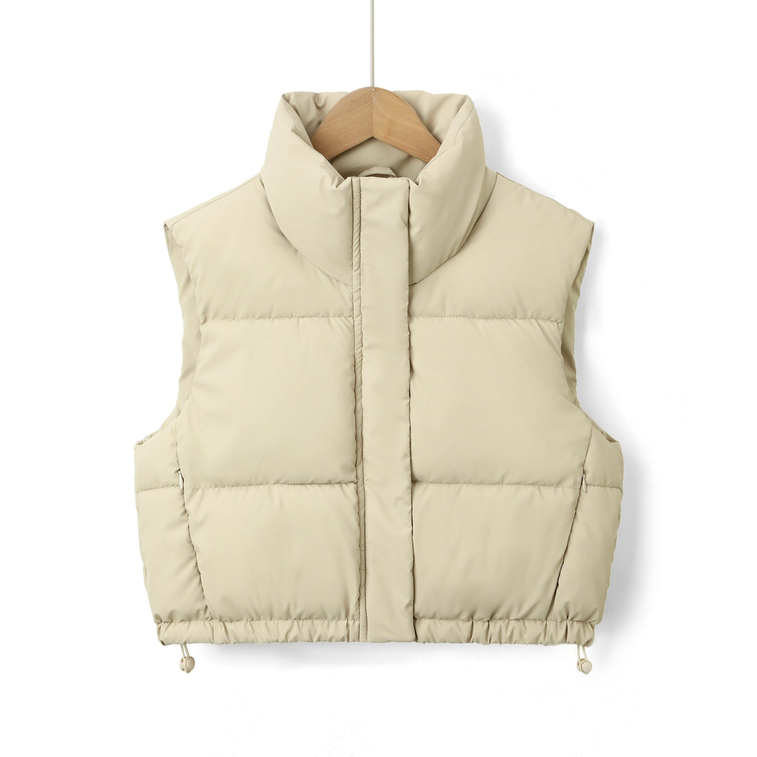 Dam vadderad kviltad väst med hög ståkrage och dragsko