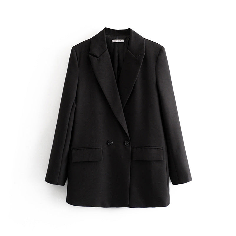 Dam figursydd lång blazer i oversized look med lapel krage och påsydda fickor