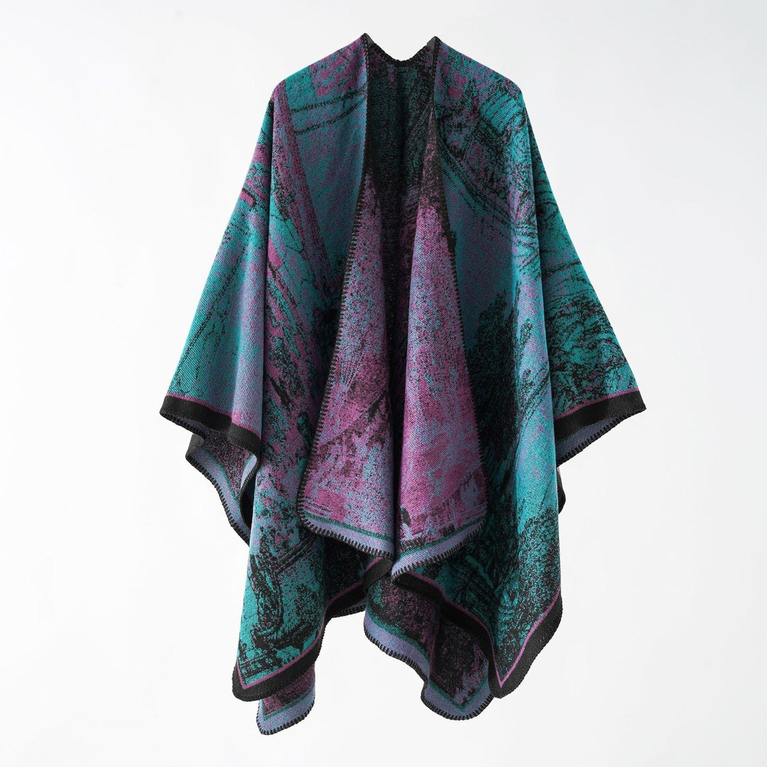 Dam jacquard stickad cape med textured woven look och öppen front
