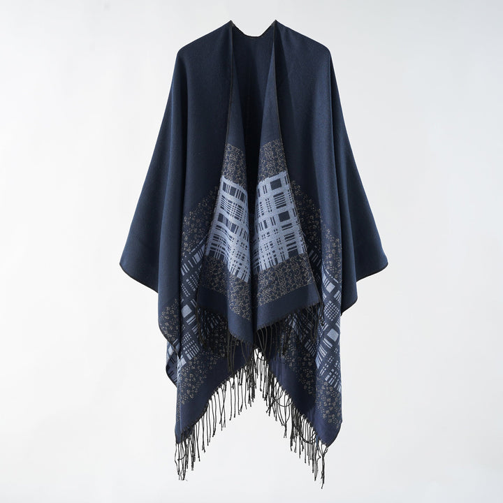 Dam ullblandning axel poncho med jacquard mönster och fransfåll