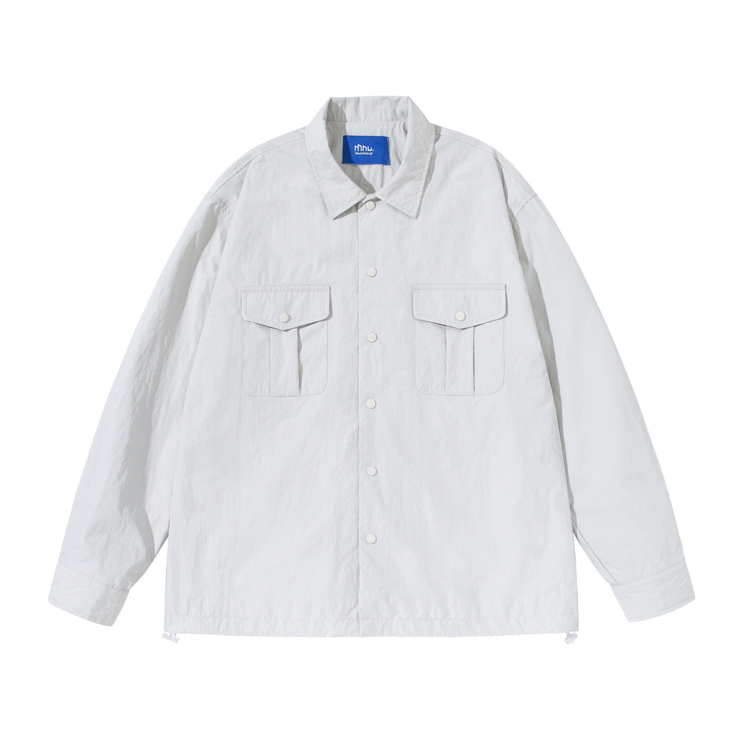 Unisex Oversized Skjorta Jacka med Tryckknappsslå och Lockfickor