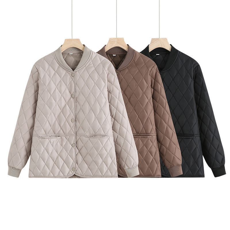 Dam quiltad övergångsjacka med diamond stitching och ribbed krage