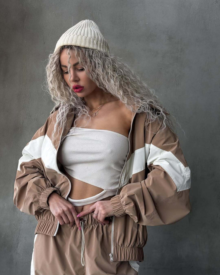 Dam lätt oversized vindjacka med kontrast panels, drawstring fåll, och elastiska muddar