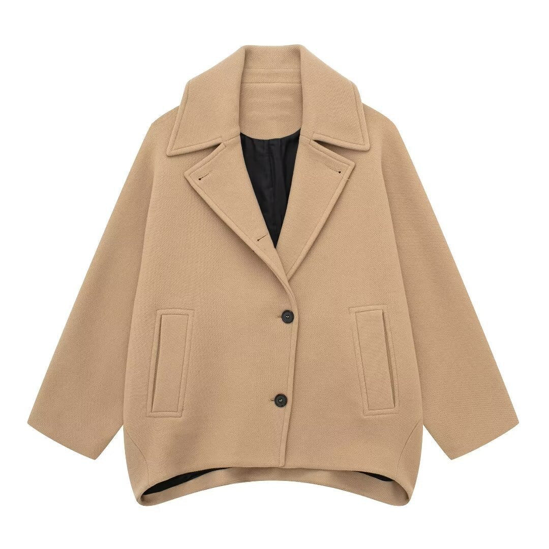 Dam kort skuren oversize ullblandning caban med vid lapels och boxy silhuett