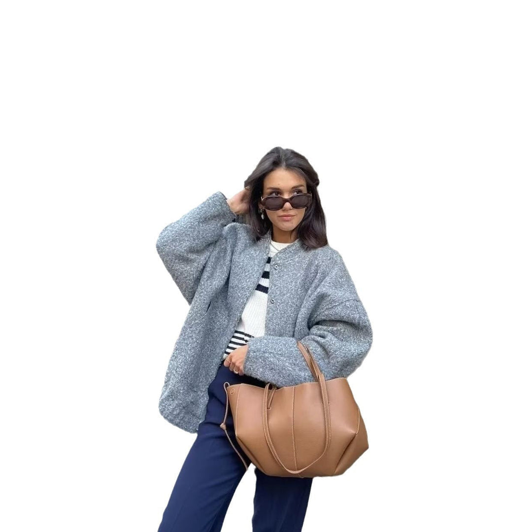 Dam boxy ullblandning blouson med ståkrage, concealed front placket, sidofickor och elastisk fåll