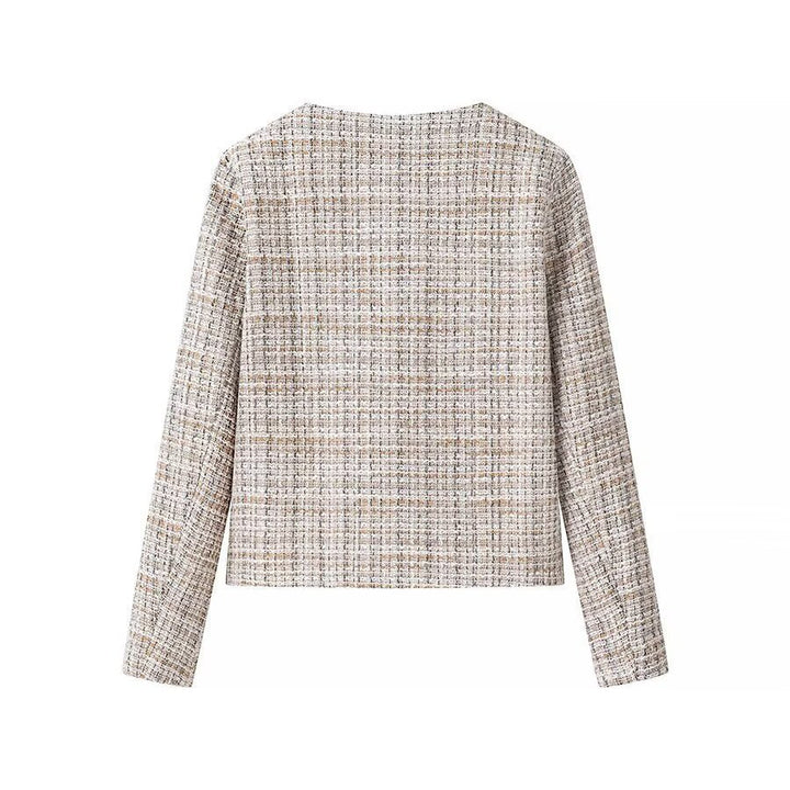Dam kort jacka gjord bouclé tweed med a round neckline och dekorativ guldknappar
