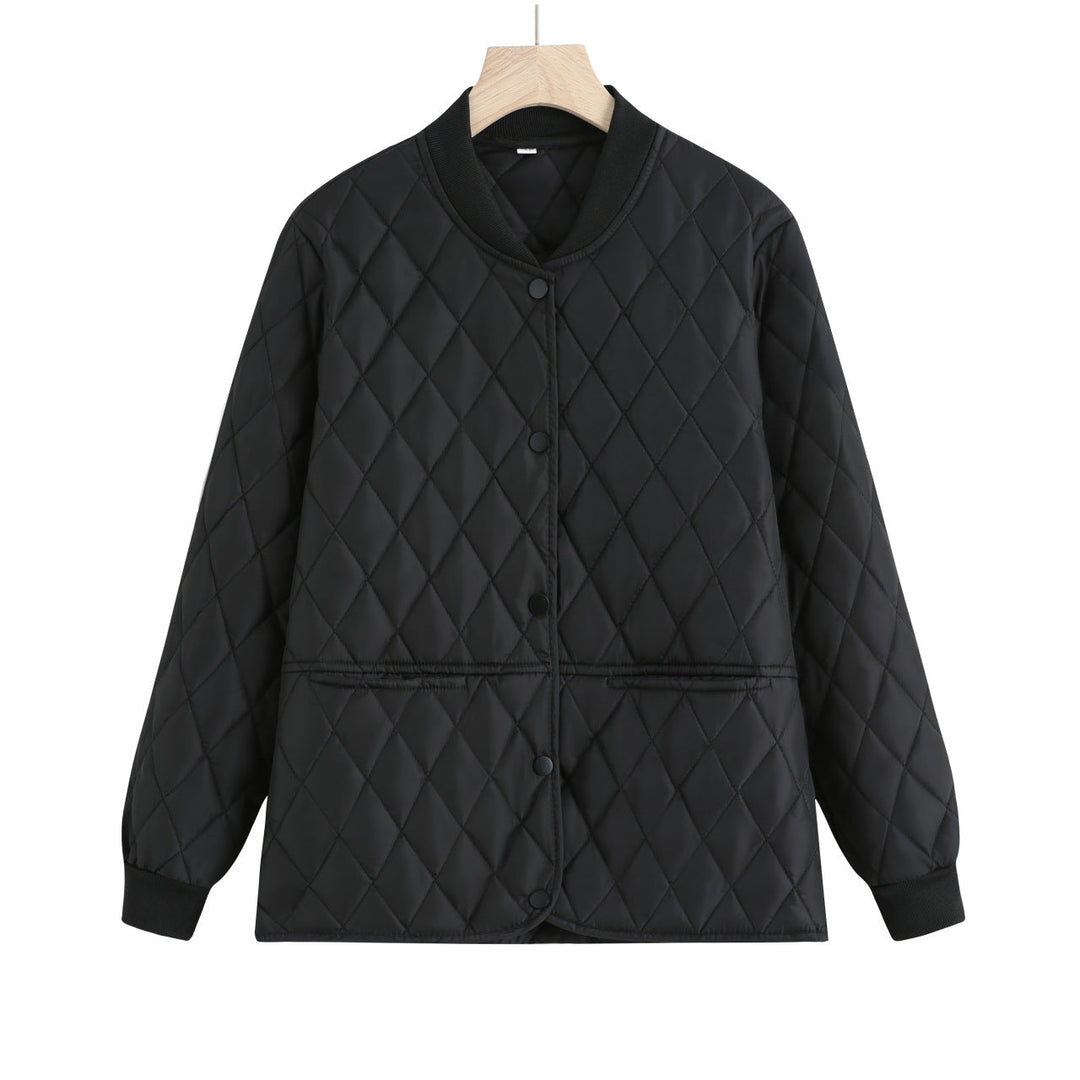 Dam quiltad övergångsjacka med diamond stitching och ribbed krage