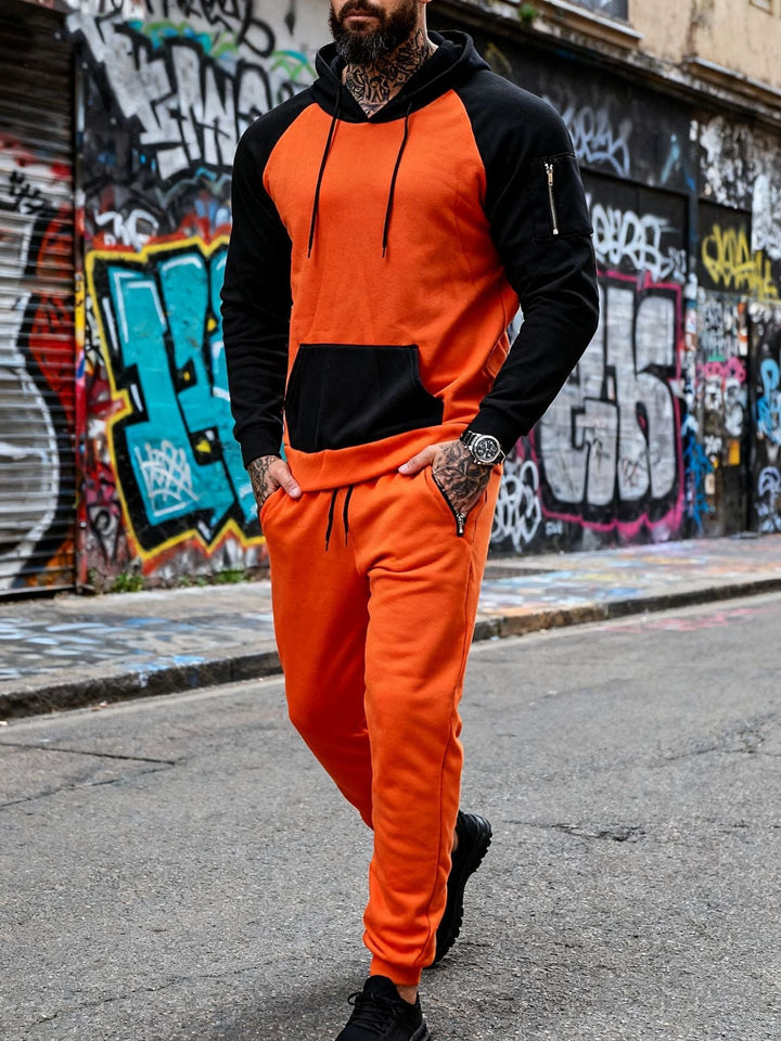 Herr Two-Piece med Huva Sweat Set med Raglanärmar, Ärm Dragkedja Ficka, och Tapered Jogging Byxor