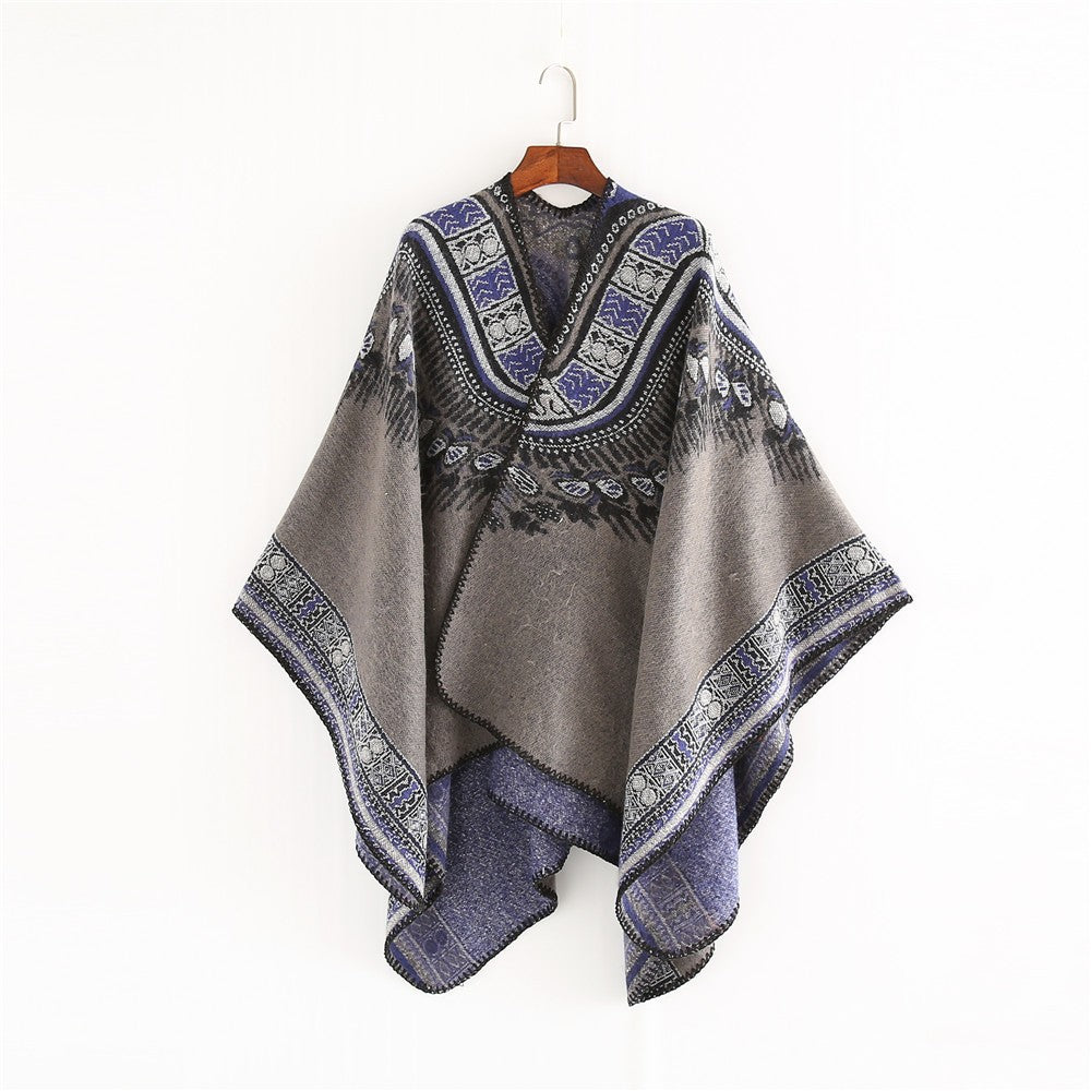 Dam Oversize poncho i Ethno Jacquard med V-neck och structured fåll