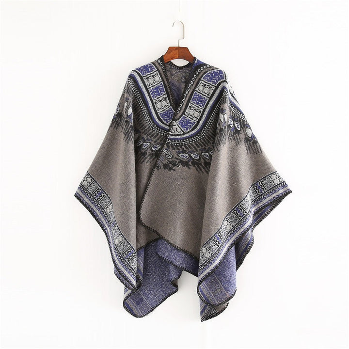 Dam Oversize poncho i Ethno Jacquard med V-neck och structured fåll