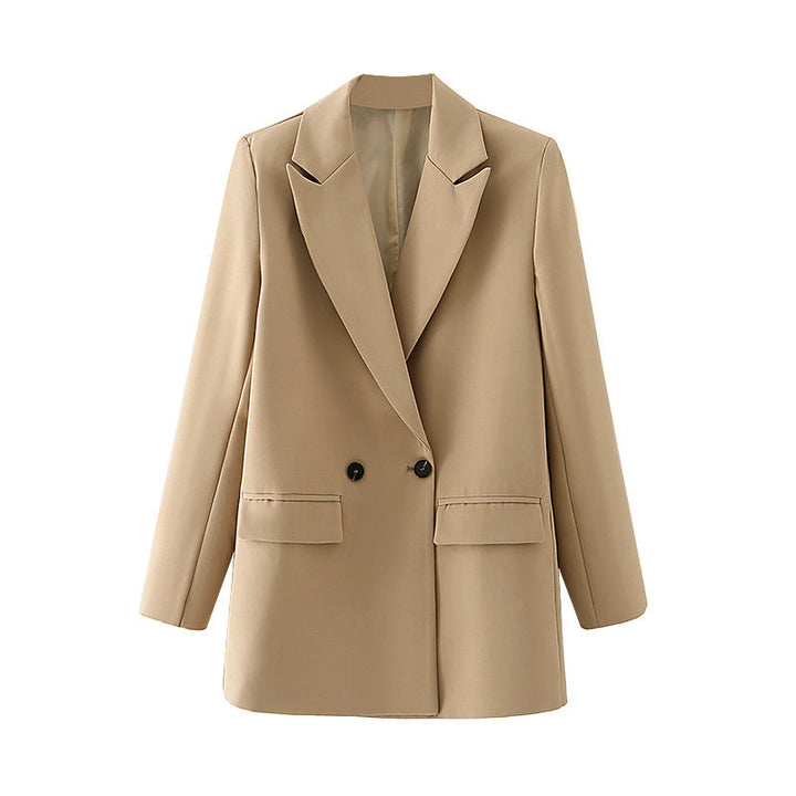 Dam figursydd lång blazer i oversized look med lapel krage och påsydda fickor