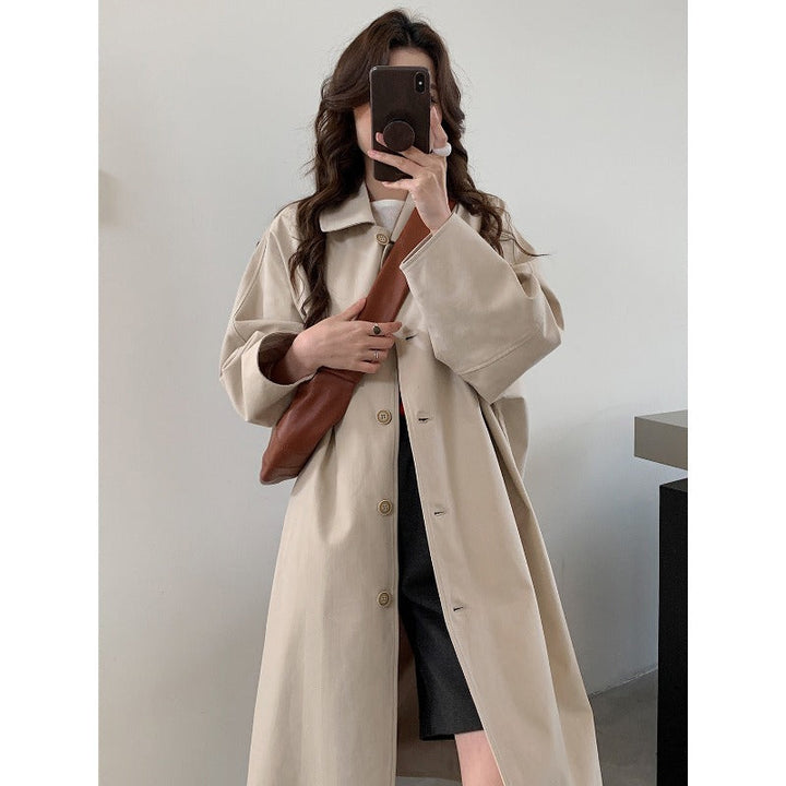 Dam lång oversize trenchcoat med vid skärning och klassisk Lapels