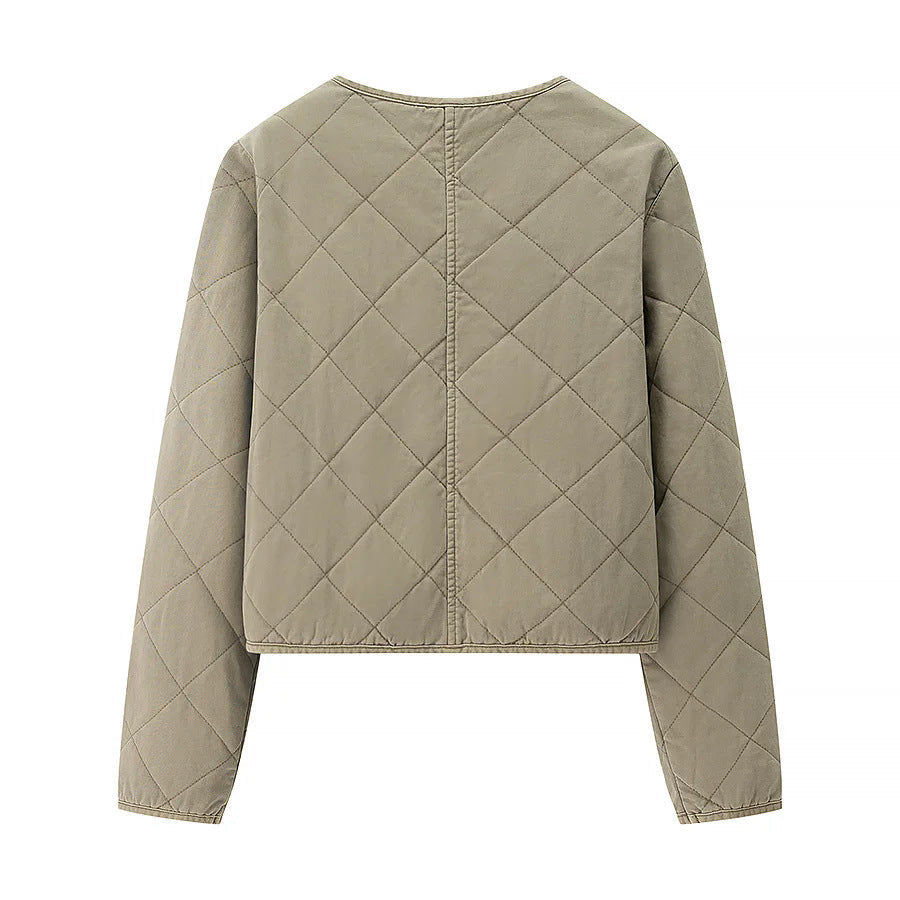 Dam kort jacka i boxy skärning med diamond quiltning, rounded fåll och concealed dragkedja