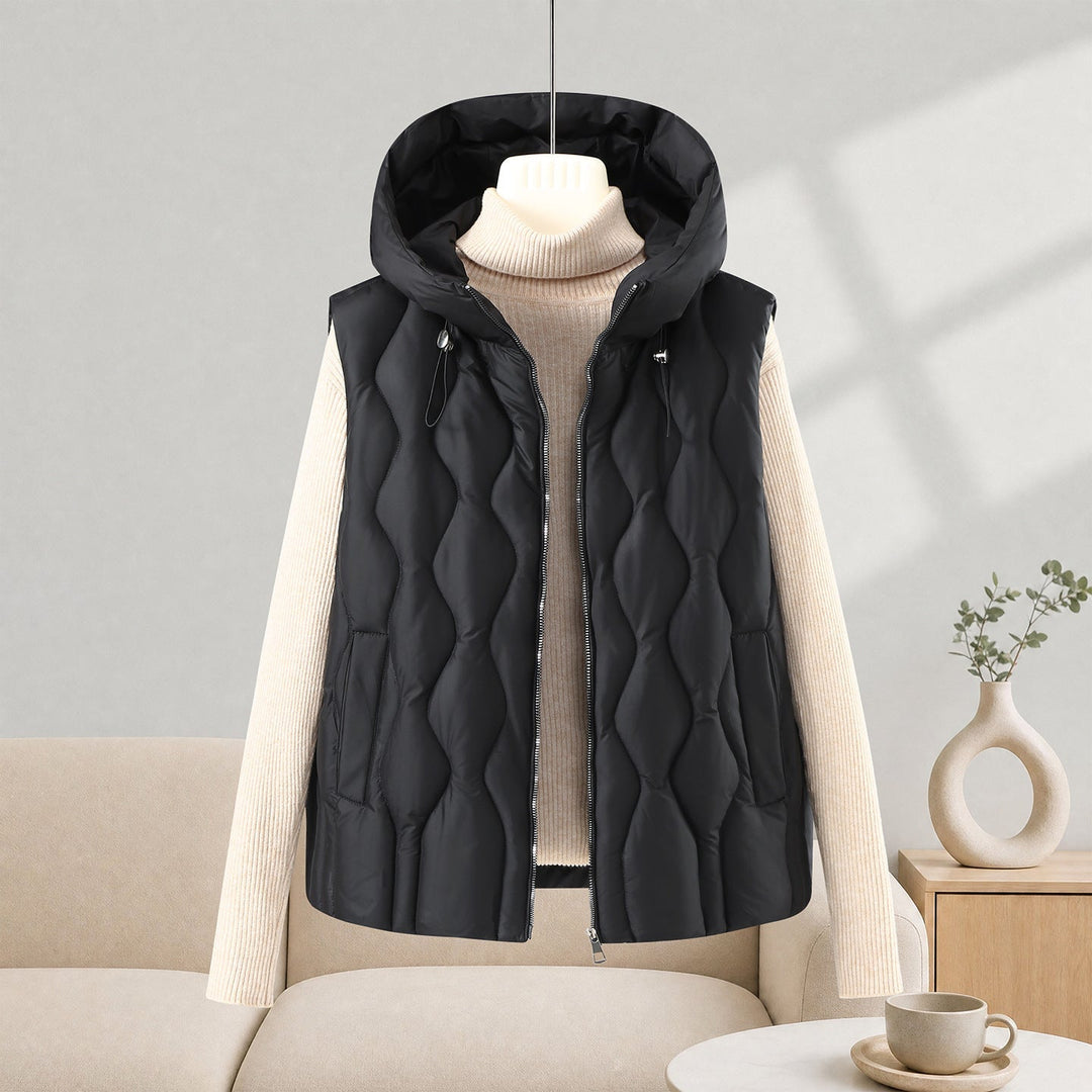 Dam longer skärning quiltad väst med huva, wave quiltning och detachable dragkedja
