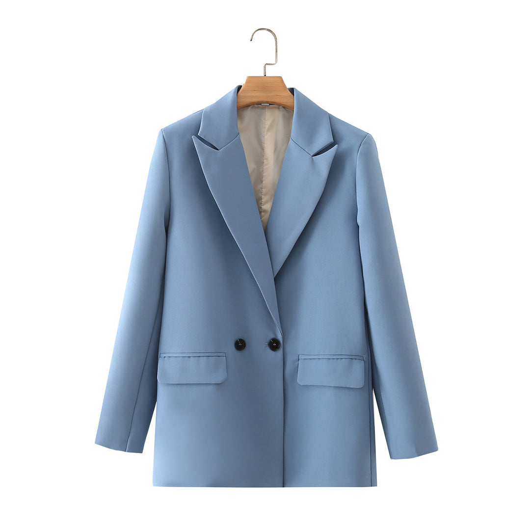 Dam figursydd lång blazer i oversized look med lapel krage och påsydda fickor
