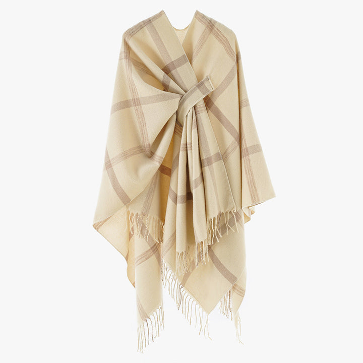 Dam oversized capeponcho tillverkad av ullblandning med tie bälte, fringes, och stor check mönster