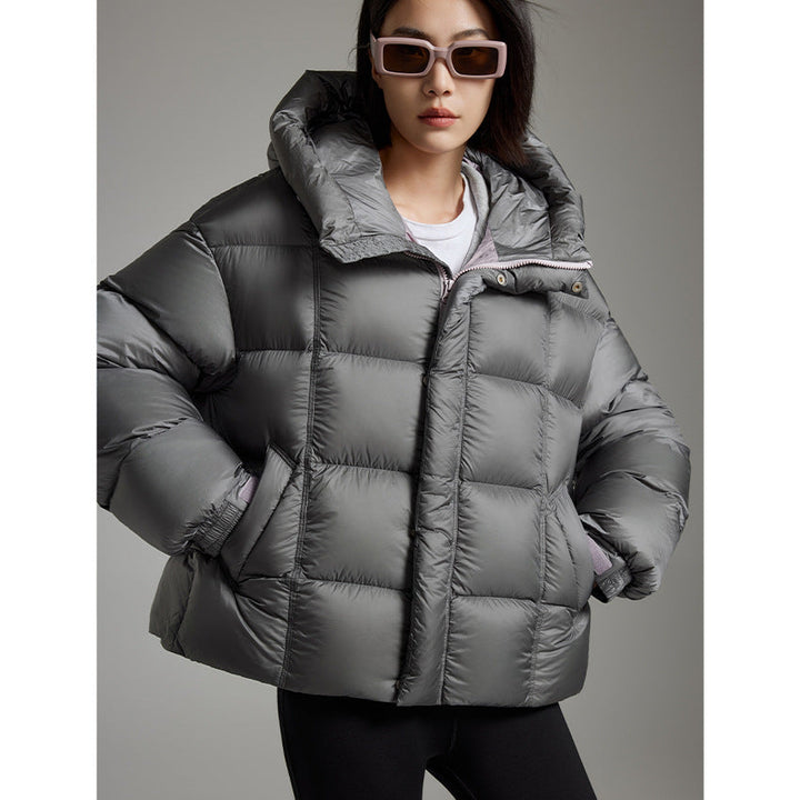 Dam kort Boxy kviltad jacka med oversize ärmar, hög Thermal krage och huva