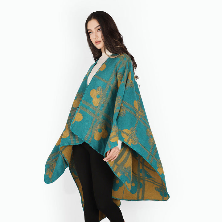Dam Reversible Jacquard poncho tillverkad av ullblandning med floral check mönster och decorative piping seam