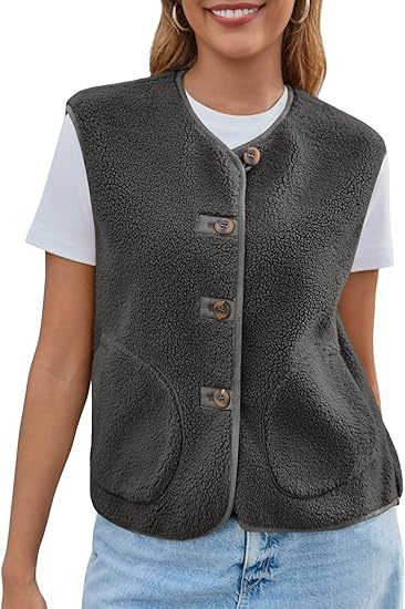 Dam teddy fleece väst med round neck och knapp stängning