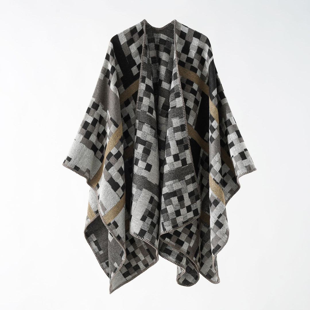Dam Kastiger Web poncho med graphic jacquard och fringe edge